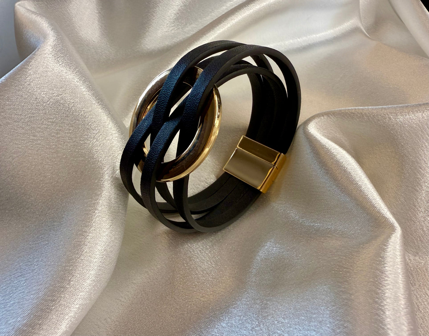 Leatherette Black & Gold Cuff Bracelet – Modern Texture with Effortless Elegance