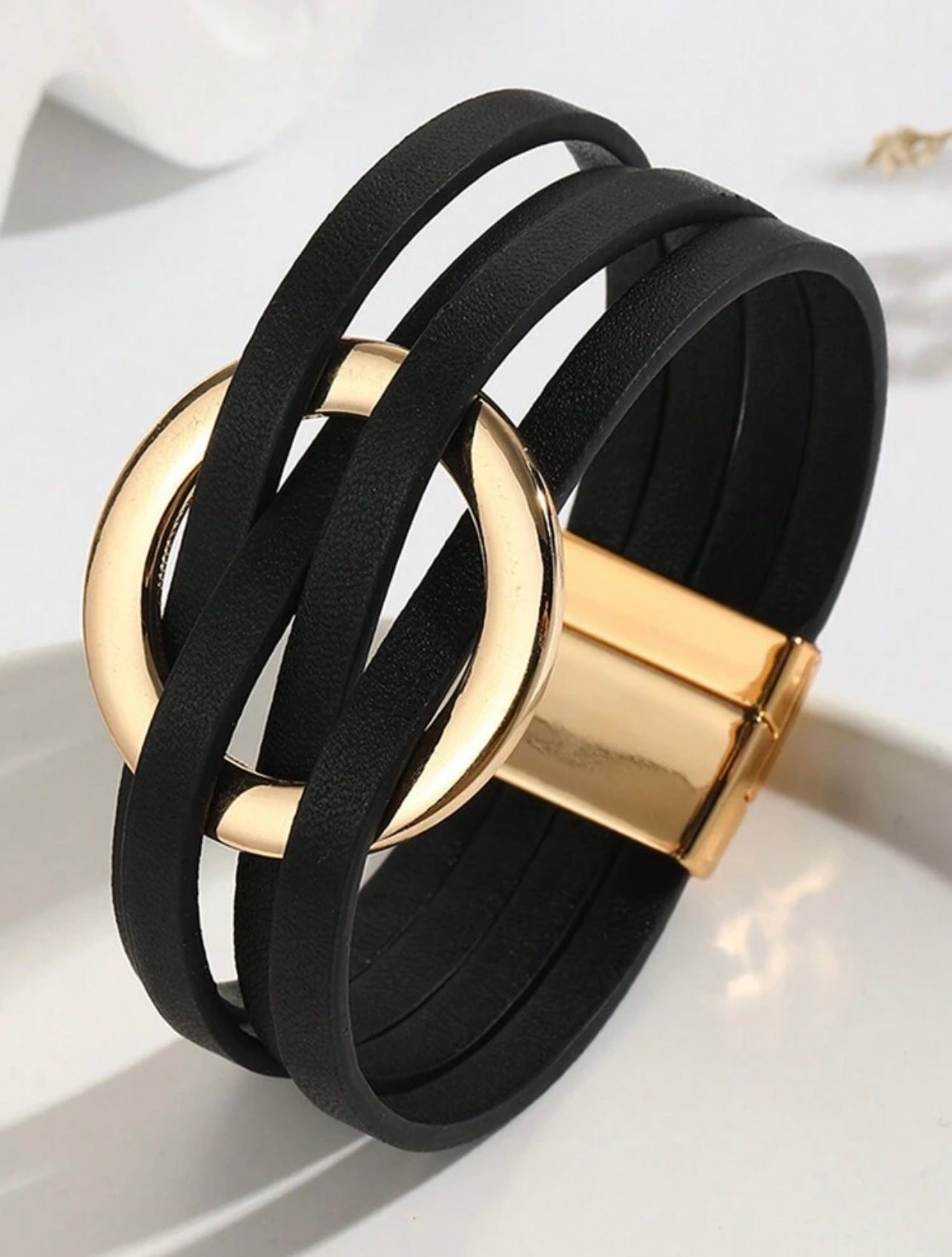 Leatherette Black & Gold Cuff Bracelet – Modern Texture with Effortless Elegance