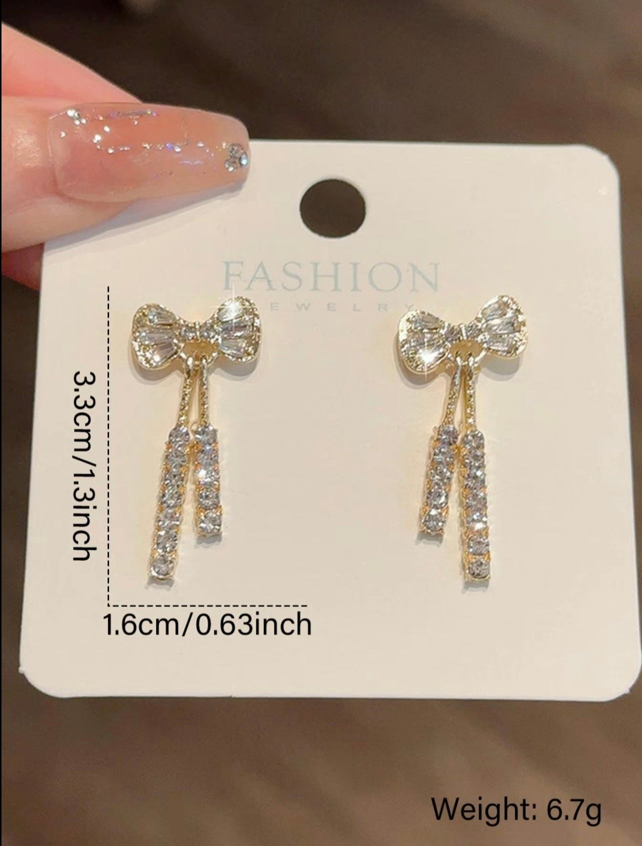Gold Bow Diamanté Drop Earrings – Elegant Sparkle with Feminine Flair