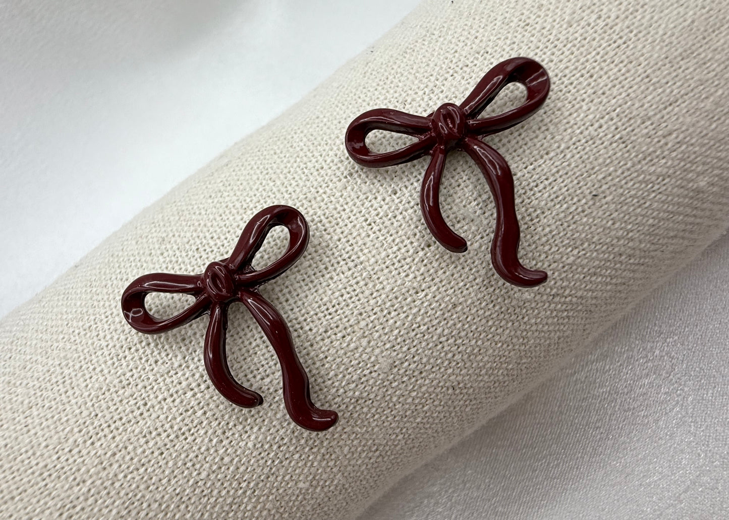 Delicate Burgundy Ribbon Bow Earrings – Tarnish-Resistant Zinc Alloy – Elegant & Feminine Jewellery – Festive Dainty Touch
