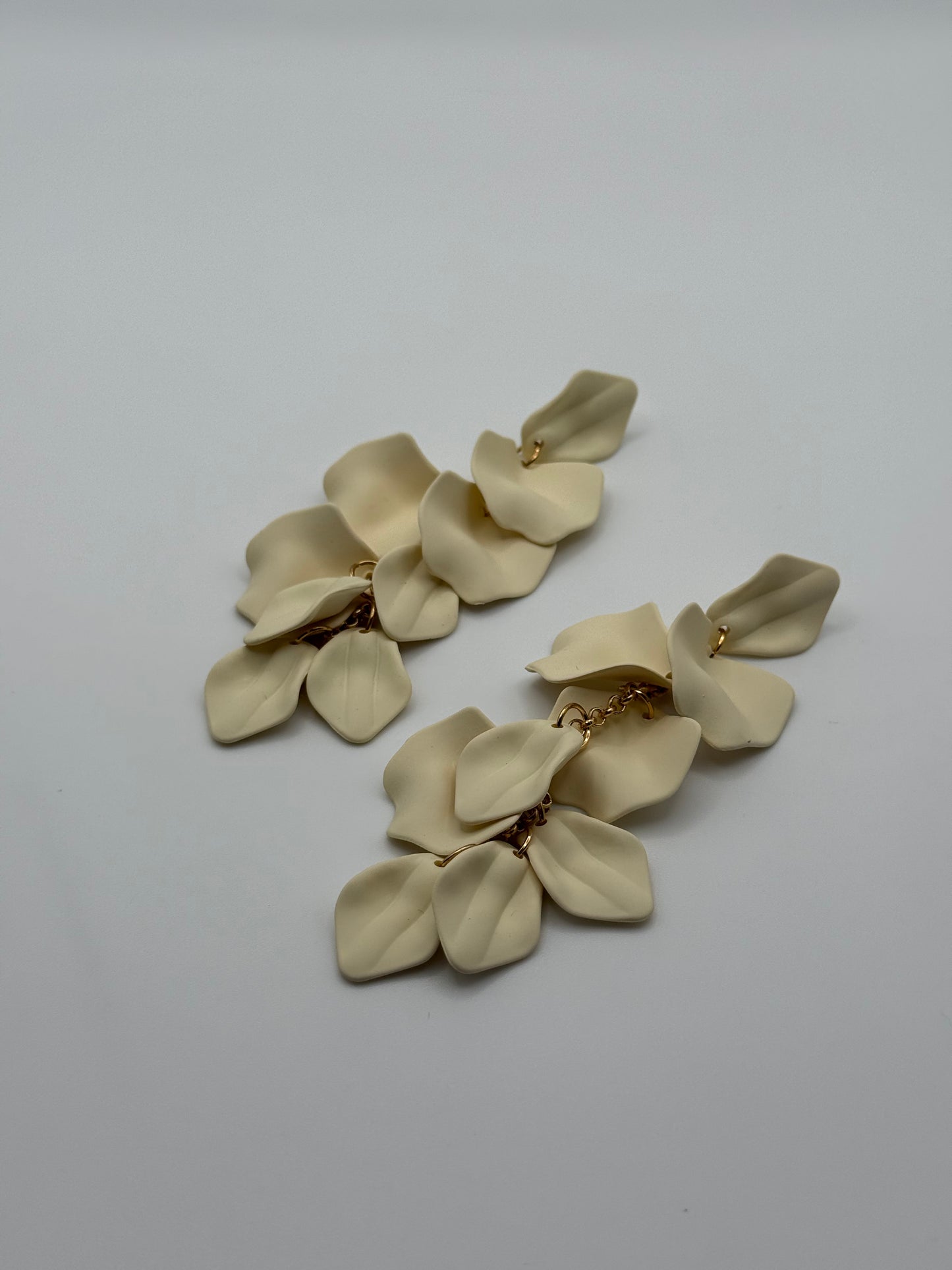 Gold & Matte Creamy White Petal Dangle Earrings – Nature-Inspired Elegance with a Modern Edge